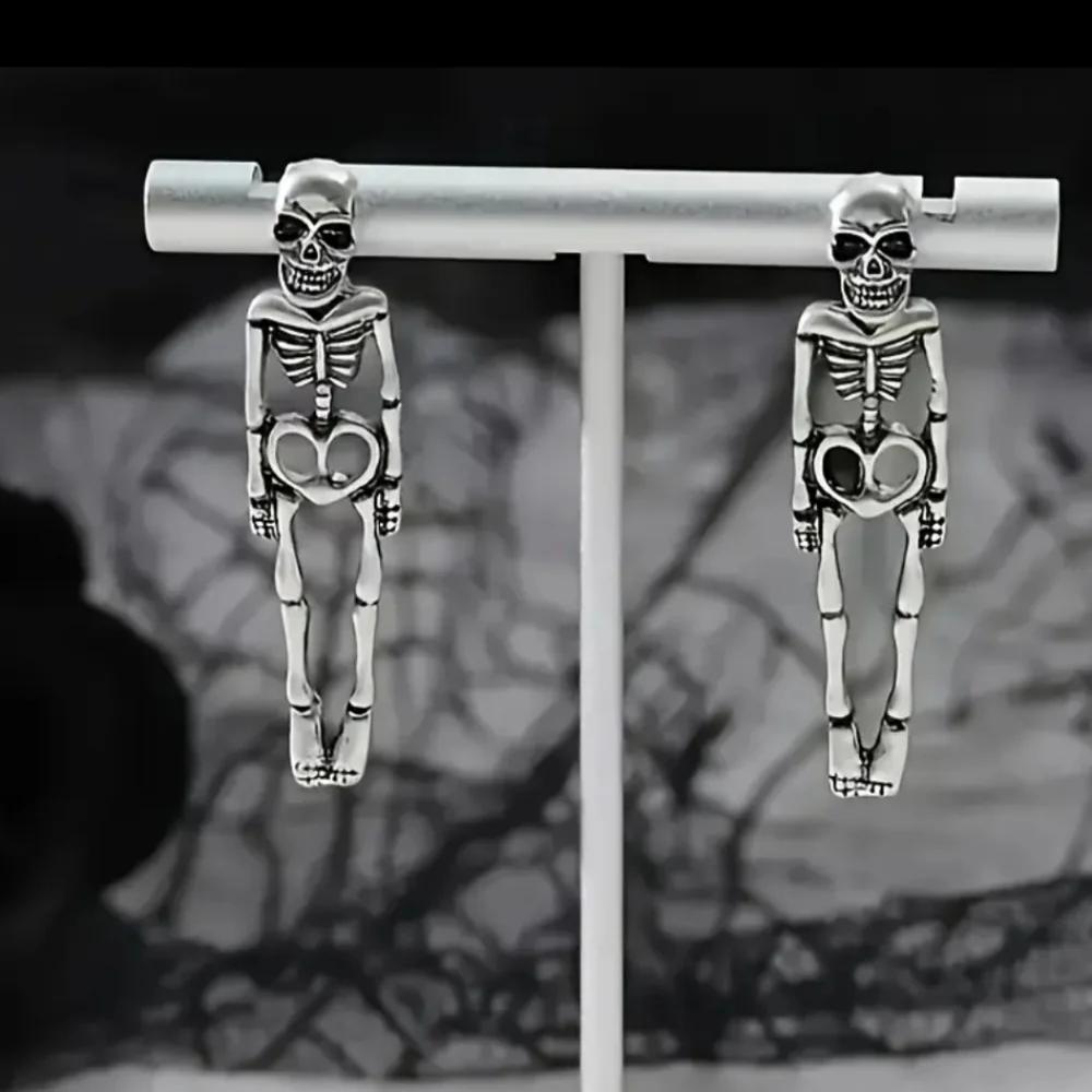 HOT TOPIC UNISEX Y2K VIBE SILVERTONE SKELETON EARRINGS NWOT